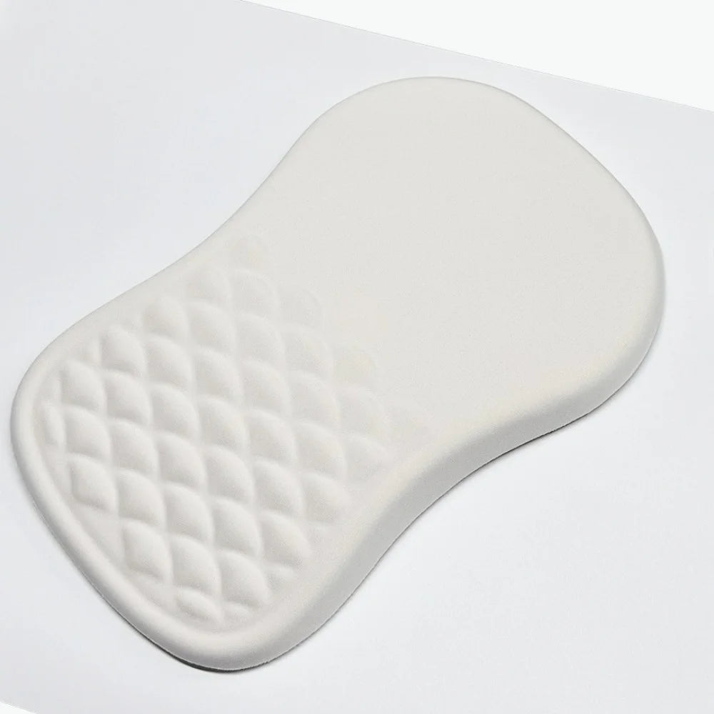 Ergonomic wrist rest detail showing stitched edge finish