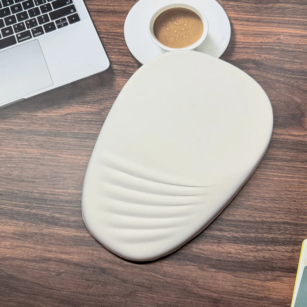 Ergonomic wrist rest close-up showing memory foam density